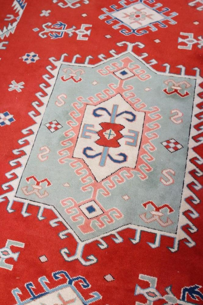 A TURKISH WOOL RUG Image