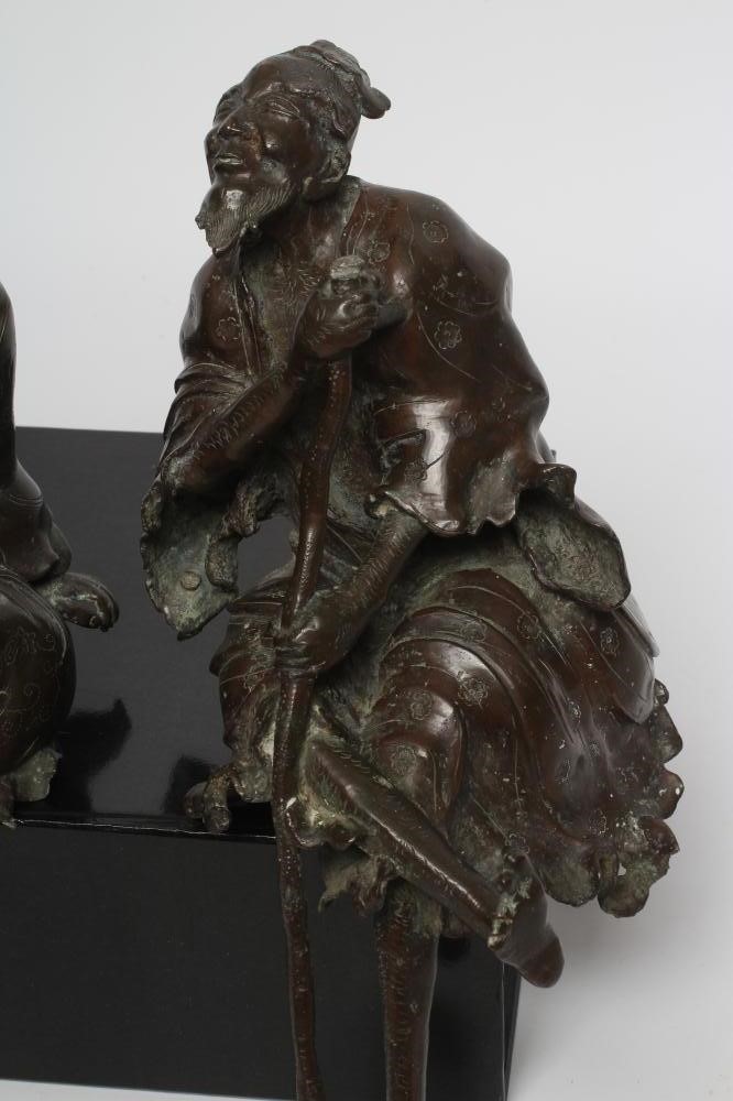 TWO CHINESE BRONZE FIGURES of seated sages Image