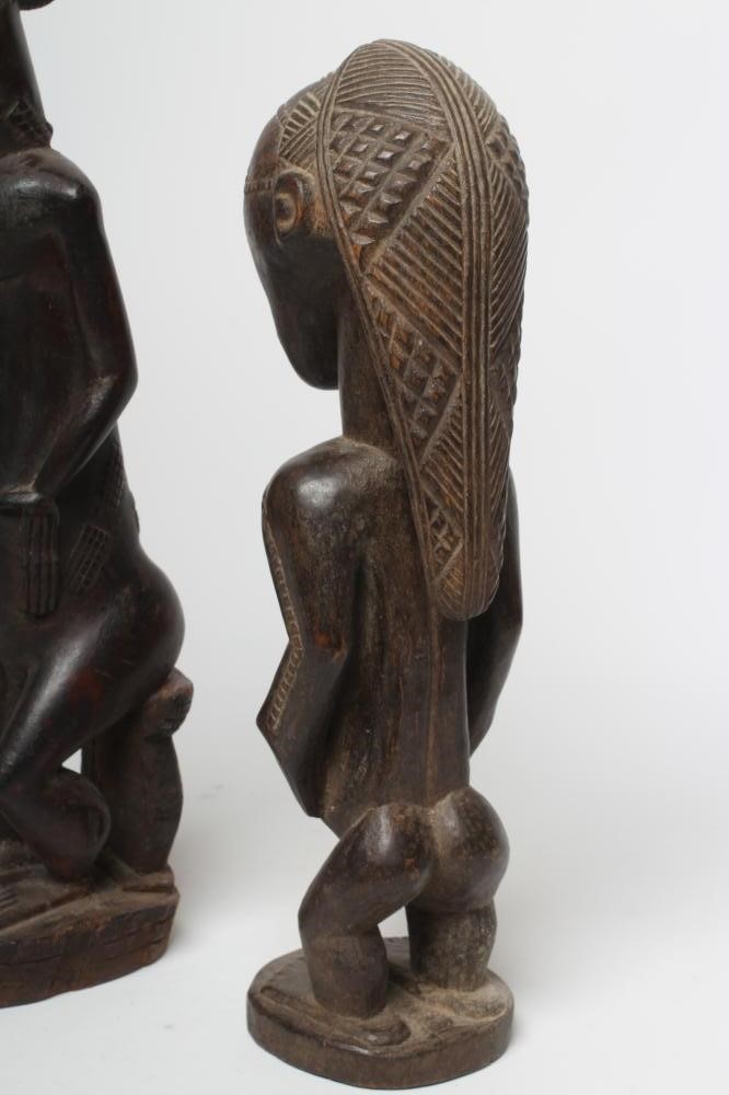 TWO AFRICAN CARVED FIGURES Image