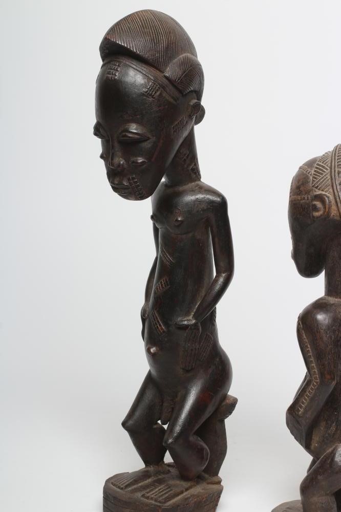 TWO AFRICAN CARVED FIGURES Image