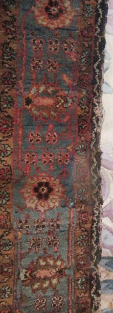 AN ANTIQUE PERSIAN RUG Image