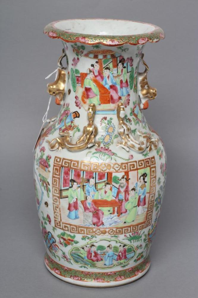 A CANTONESE PORCELAIN VASE of baluster form with salamander shoulders and shi-shi handles Image