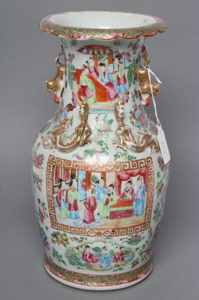 A CANTONESE PORCELAIN VASE of baluster form with salamander shoulders and shi-shi handles Image
