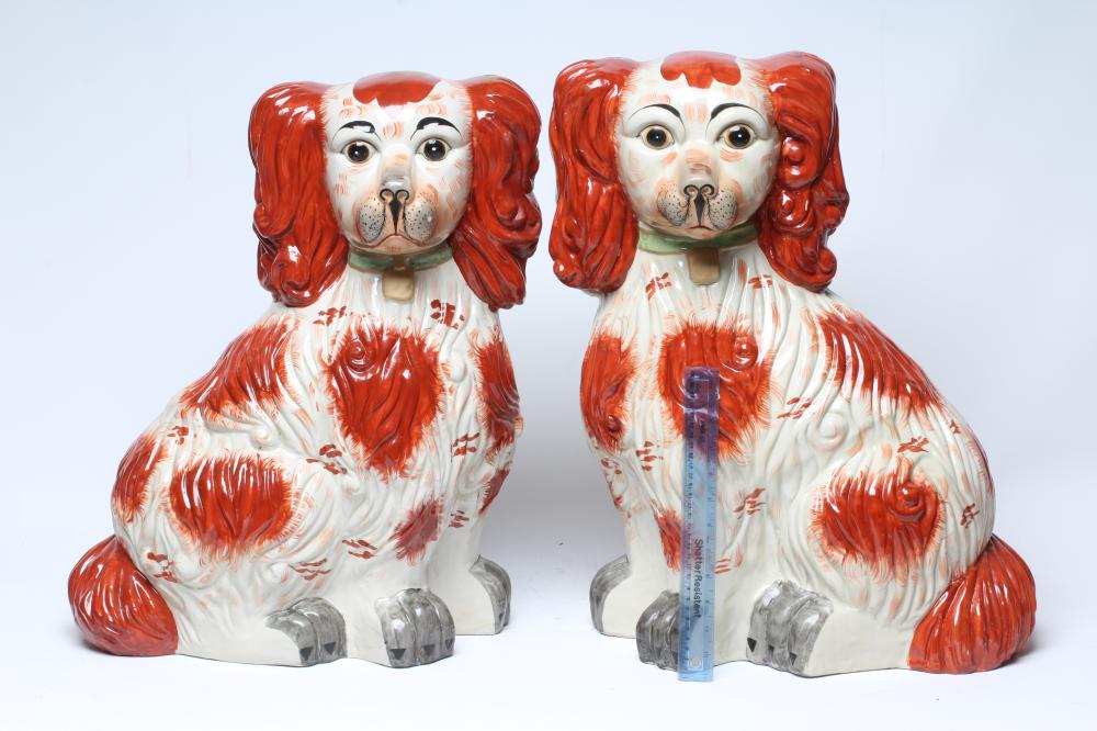 AN UNUSUALLY LARGE PAIR OF STAFFORDSHIRE STYLE POTTERY SPANIELS Image