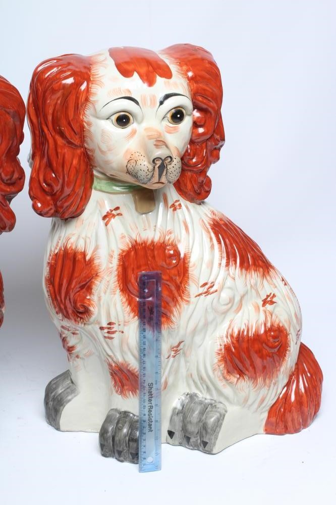 AN UNUSUALLY LARGE PAIR OF STAFFORDSHIRE STYLE POTTERY SPANIELS Image