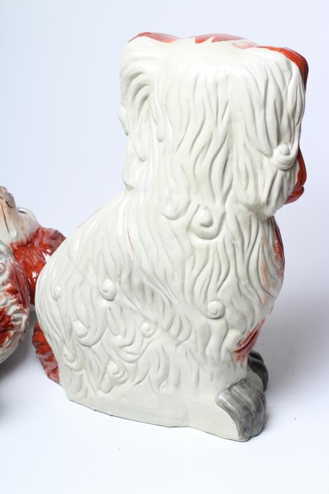 AN UNUSUALLY LARGE PAIR OF STAFFORDSHIRE STYLE POTTERY SPANIELS Image