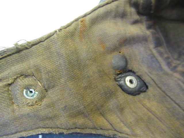 A GERMAN FIRST WORLD WAR LEATHER FLYING HELMET with small peak Image