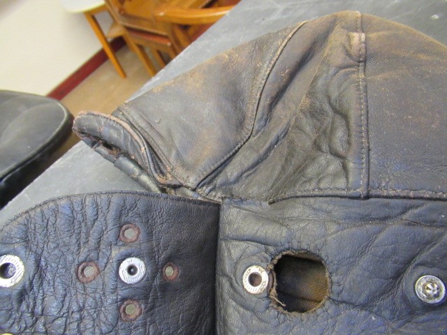 A GERMAN FIRST WORLD WAR LEATHER FLYING HELMET with small peak Image
