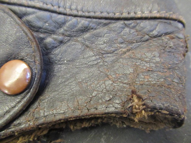 A GERMAN FIRST WORLD WAR LEATHER FLYING HELMET with small peak Image
