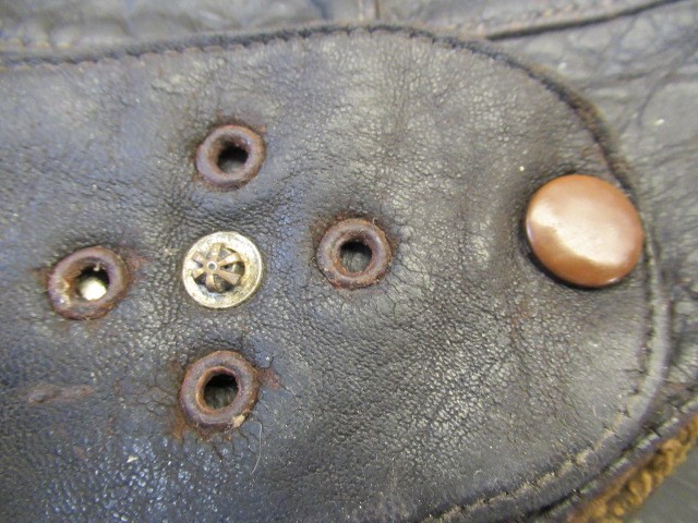 A GERMAN FIRST WORLD WAR LEATHER FLYING HELMET with small peak Image