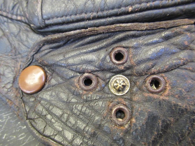 A GERMAN FIRST WORLD WAR LEATHER FLYING HELMET with small peak Image