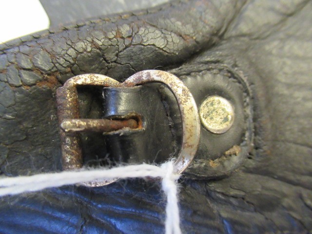 A GERMAN FIRST WORLD WAR LEATHER FLYING HELMET with small peak Image
