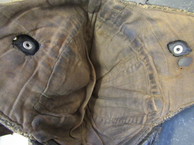 A GERMAN FIRST WORLD WAR LEATHER FLYING HELMET with small peak Image