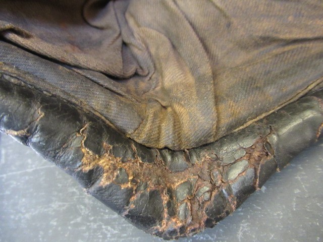 A GERMAN FIRST WORLD WAR LEATHER FLYING HELMET with small peak Image