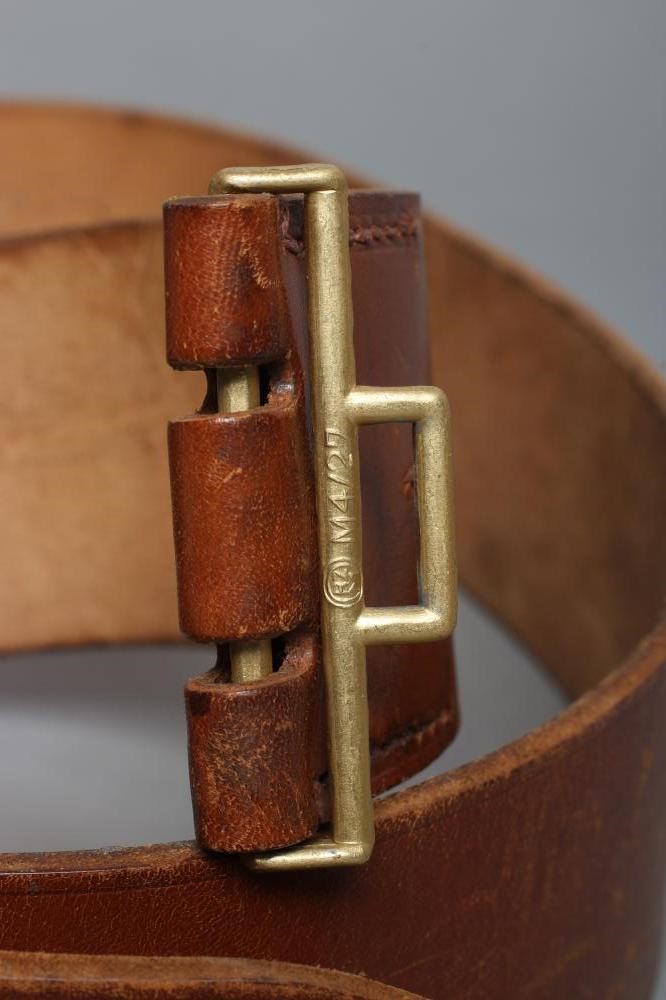 A THIRD REICH ARMY OFFICER'S BELT with gilt buckle bearing reichsadler within acorn wreath Image
