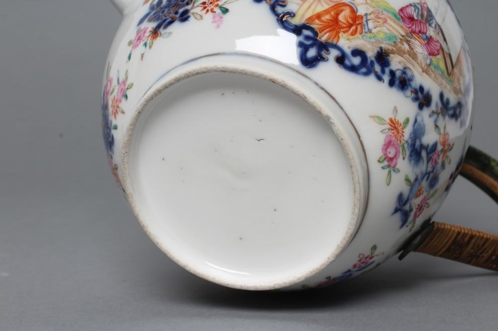 A CHINESE EXPORT PORCELAIN TEAPOT AND COVER of globular form with crabstock spout and later cane Image