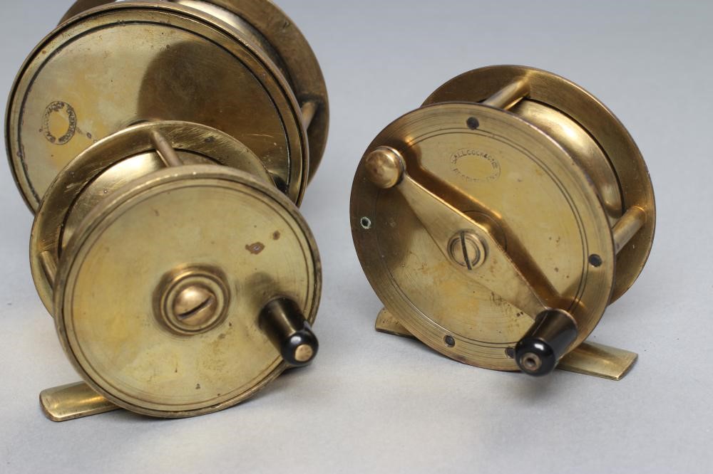FOUR ANTIQUE BRASS FISHING REELS Image