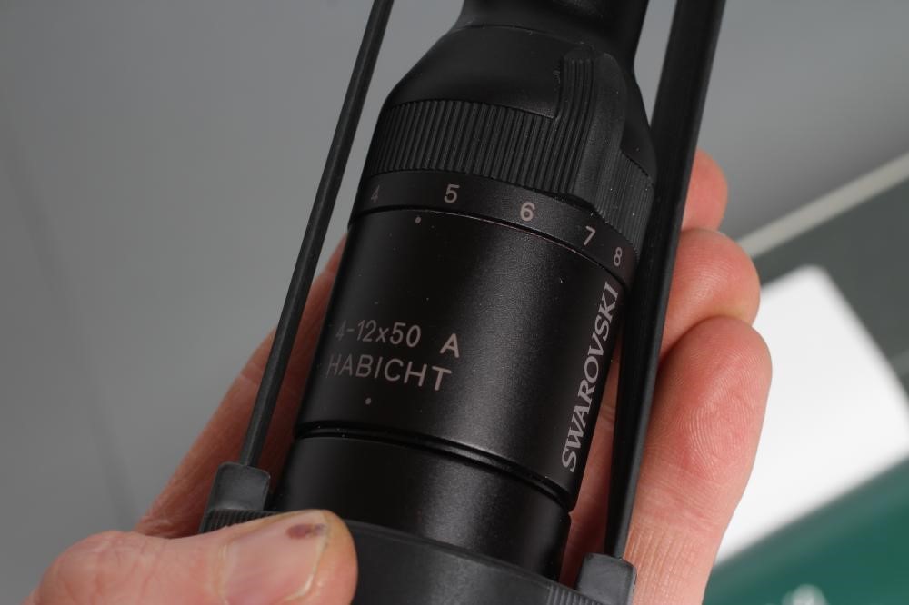 A SWAROVSKI HABICHT 4-12X50 A RIFLE SCOPE with lens caps Image