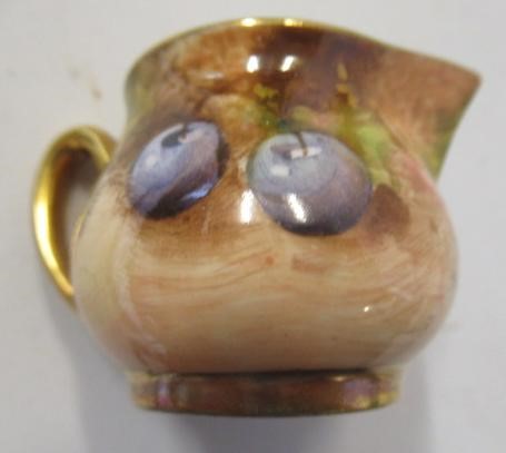 A ROYAL WORCESTER CHINA MINIATURE SOLITAIRE Image