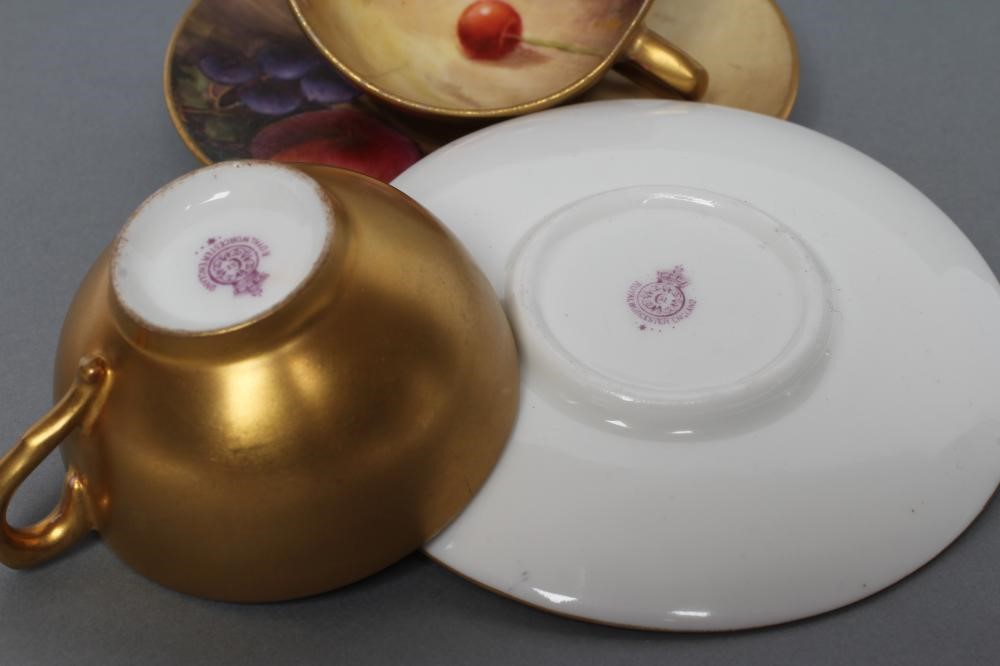 A PAIR OF ROYAL WORCESTER CHINA SMALL CABINET CUPS AND SAUCERS Image