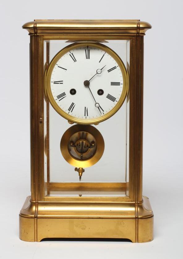 A FRENCH FOUR GLASS MANTEL CLOCK Image