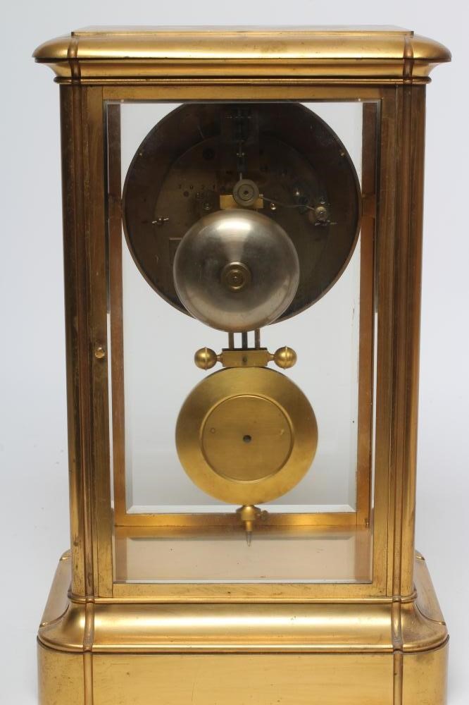 A FRENCH FOUR GLASS MANTEL CLOCK Image