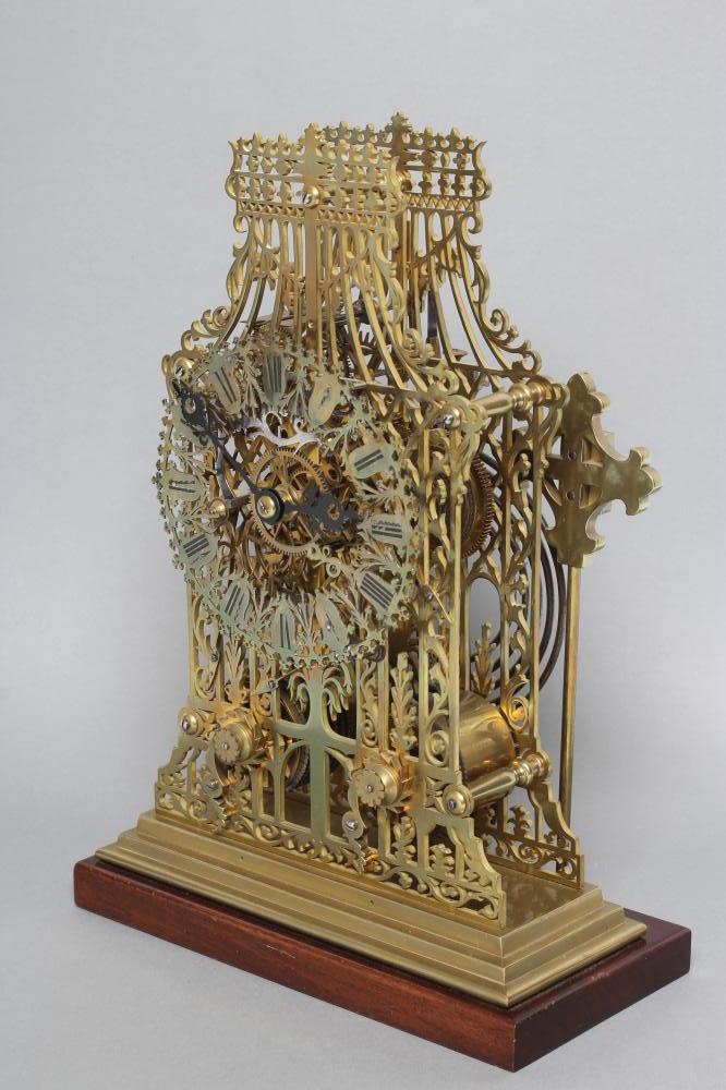 A BRASS CATHEDRAL SKELETON CLOCK Image