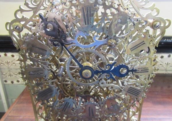 A BRASS CATHEDRAL SKELETON CLOCK Image