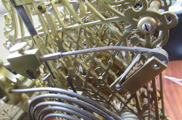 A BRASS CATHEDRAL SKELETON CLOCK Image