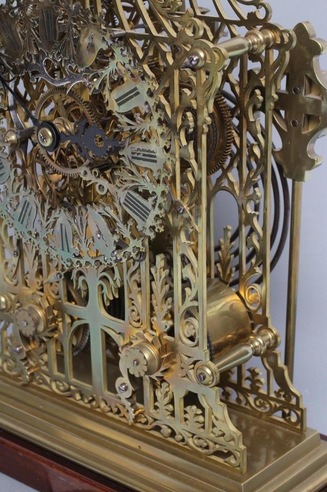 A BRASS CATHEDRAL SKELETON CLOCK Image