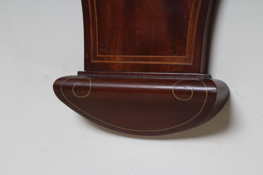 AN EDWARDIAN MAHOGANY ANEROID BAROMETER Image