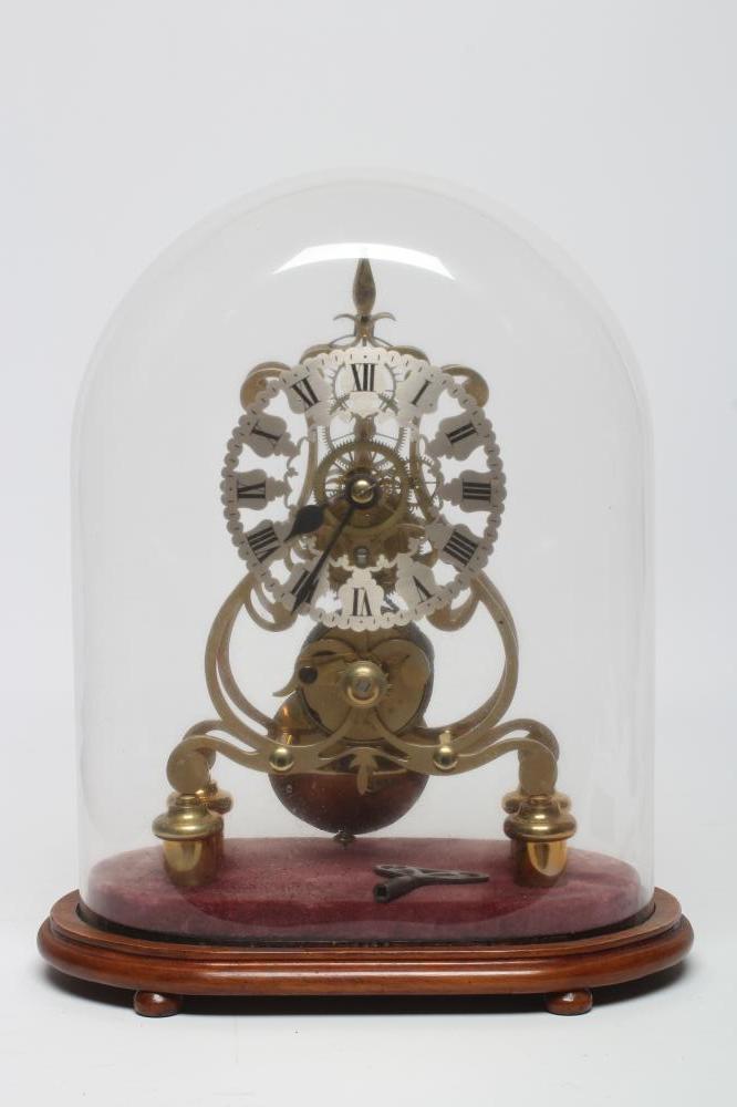 A BRASS SKELETON CLOCK Image
