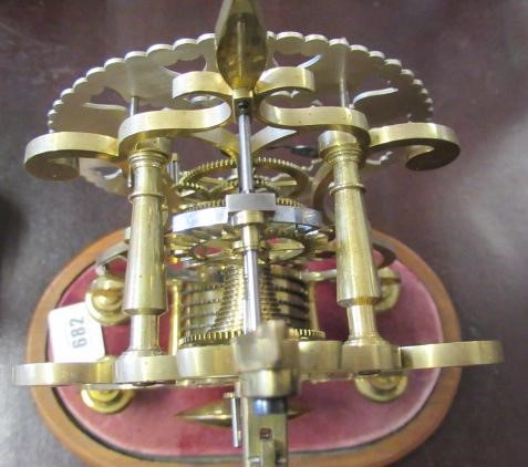 A BRASS SKELETON CLOCK Image