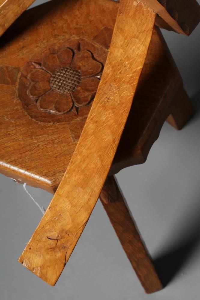 A PAIR OF HERBERT BIRD ADZED OAK THREE LEGGED STOOLS Image