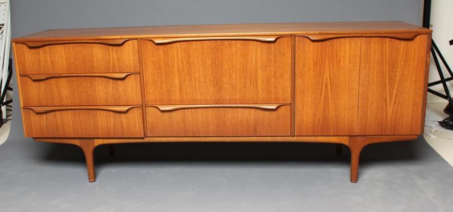 A MID 20TH CENTURY RETRO "S" FORM TODMORDEN TEAK SIDEBOARD Image