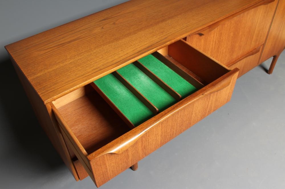 A MID 20TH CENTURY RETRO "S" FORM TODMORDEN TEAK SIDEBOARD Image