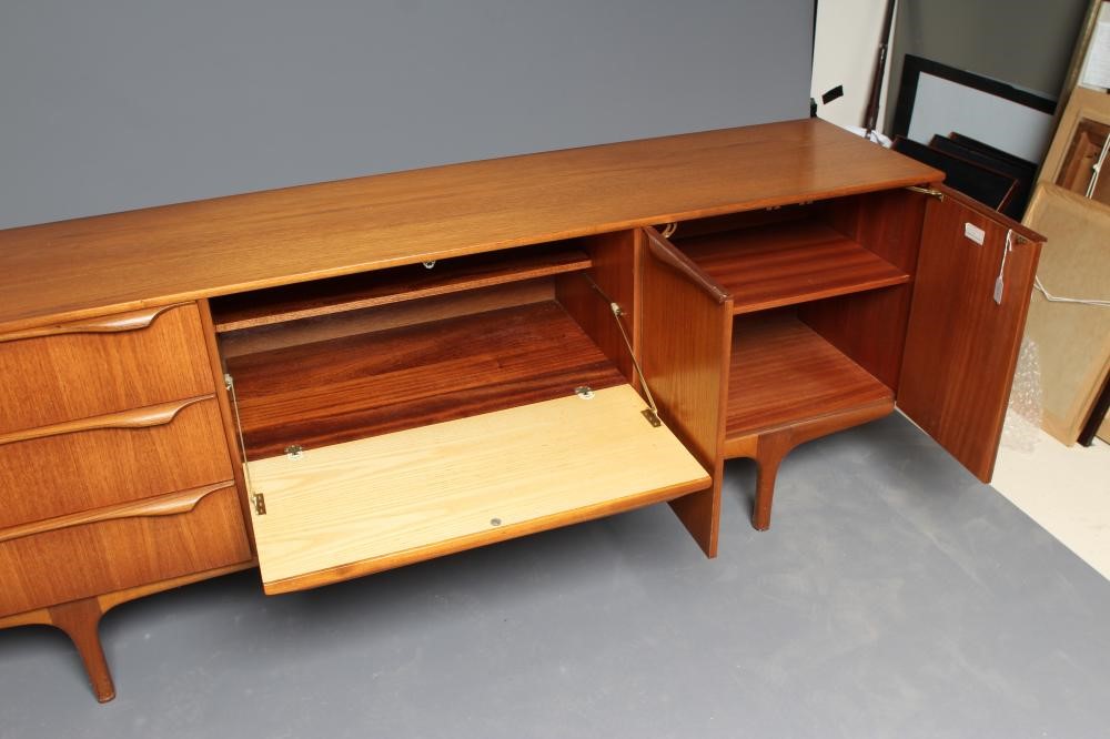 A MID 20TH CENTURY RETRO "S" FORM TODMORDEN TEAK SIDEBOARD Image