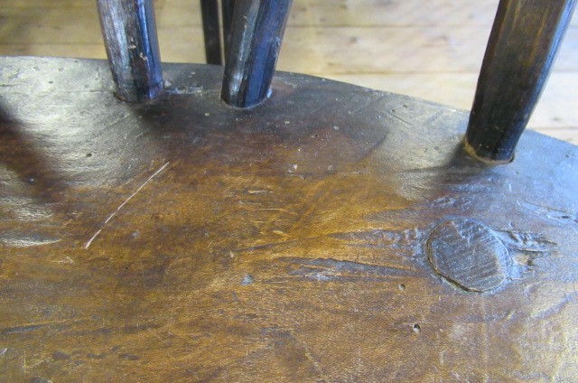 A PRIMITIVE STICK BACK WINDSOR ARMCHAIR Image