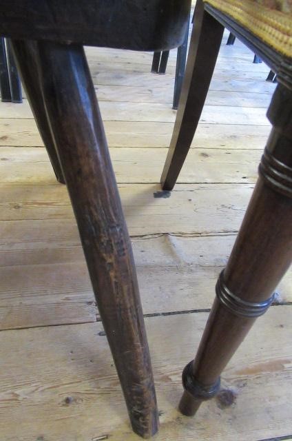 A PRIMITIVE STICK BACK WINDSOR ARMCHAIR Image