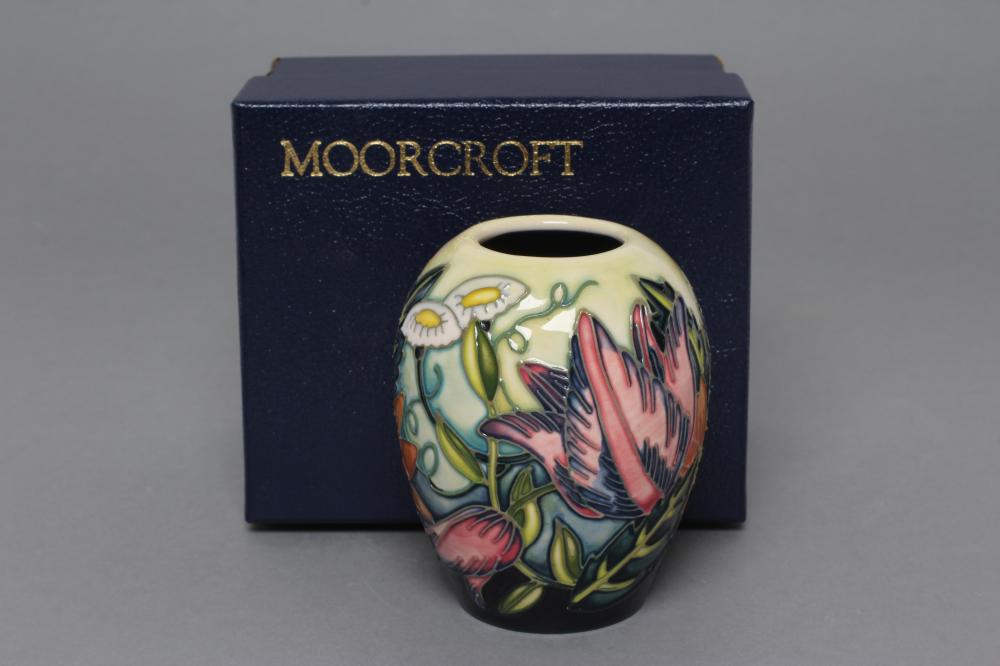 A MOORCROFT POTTERY CASTLE GARDEN PATTERN SMALL VASE Image