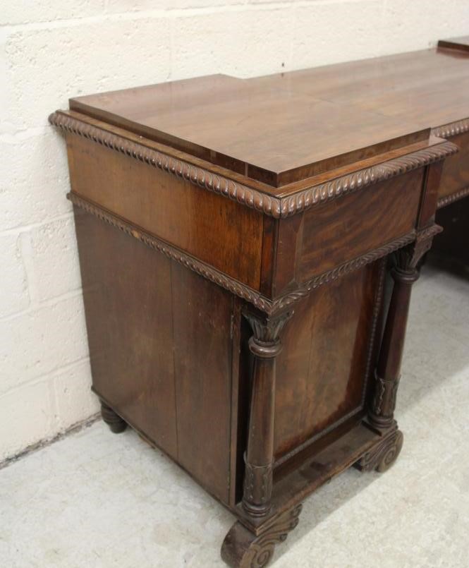 A REGENCY MAHOGANY PEDESTAL SIDEBOARD Image