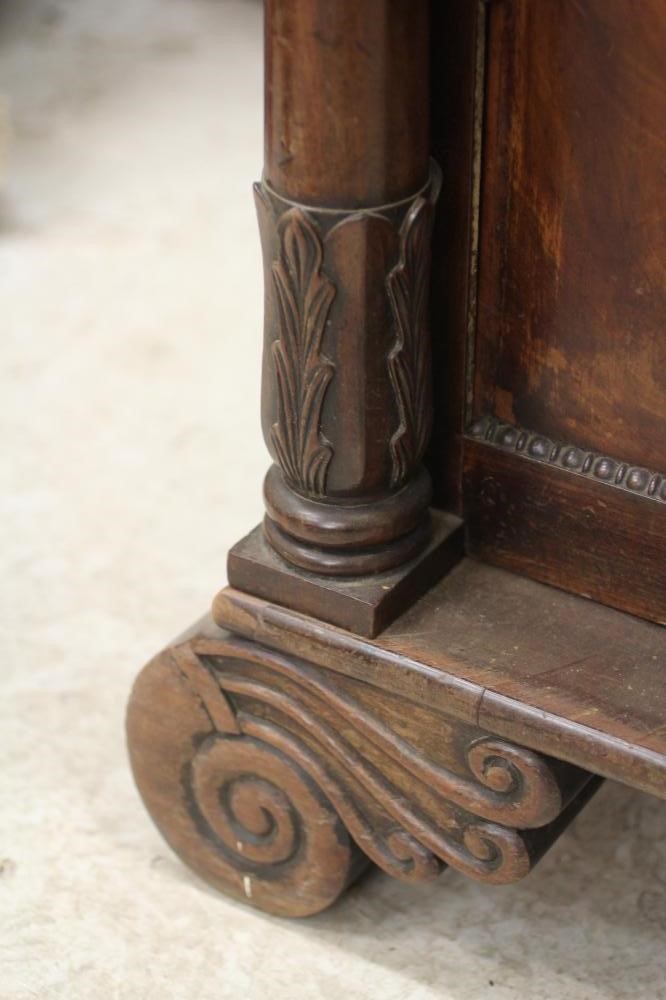 A REGENCY MAHOGANY PEDESTAL SIDEBOARD Image