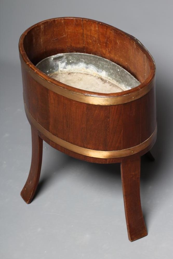 AN OAK CELLARETTE Image