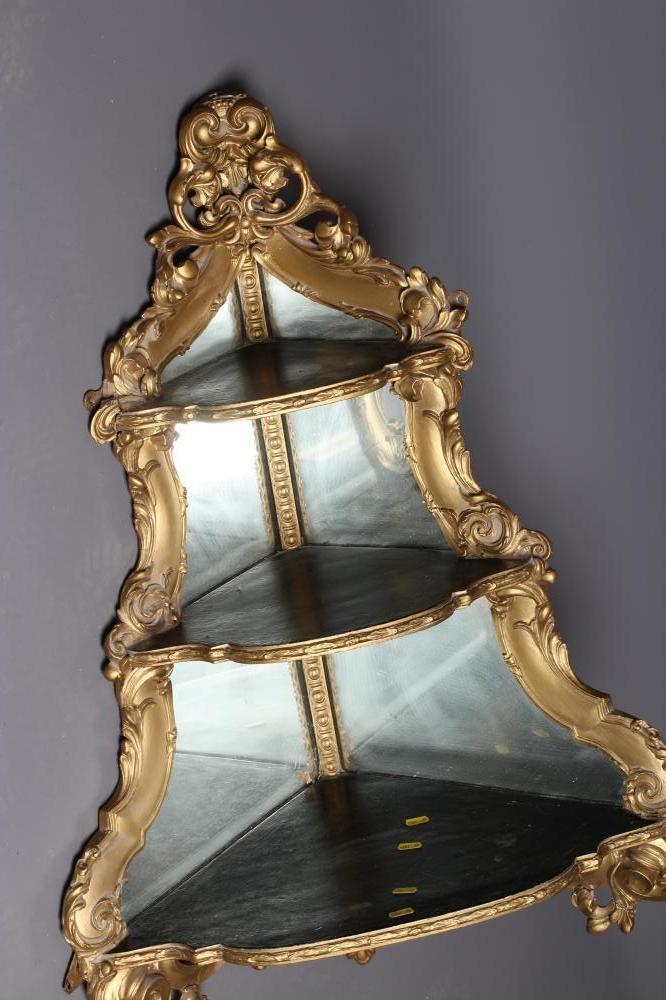 A VICTORIAN GILT WOOD AND GESSO CORNER BRACKET SHELF Image