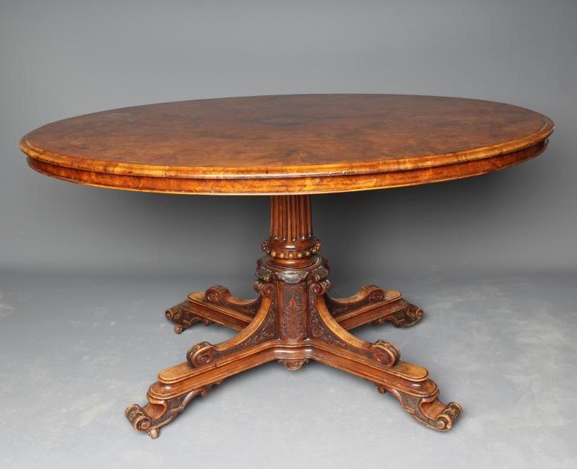A VICTORIAN BURR WALNUT CENTRE TABLE Image