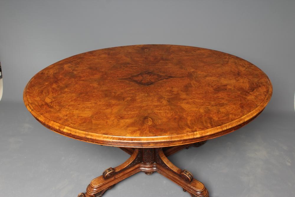 A VICTORIAN BURR WALNUT CENTRE TABLE Image