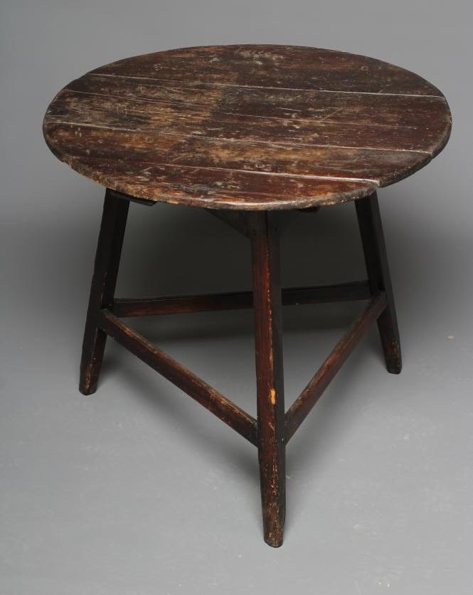 A STAINED PINE CRICKET TABLE Image