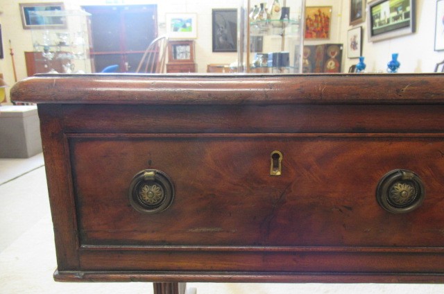 A REGENCY MAHOGANY LIBRARY TABLE Image