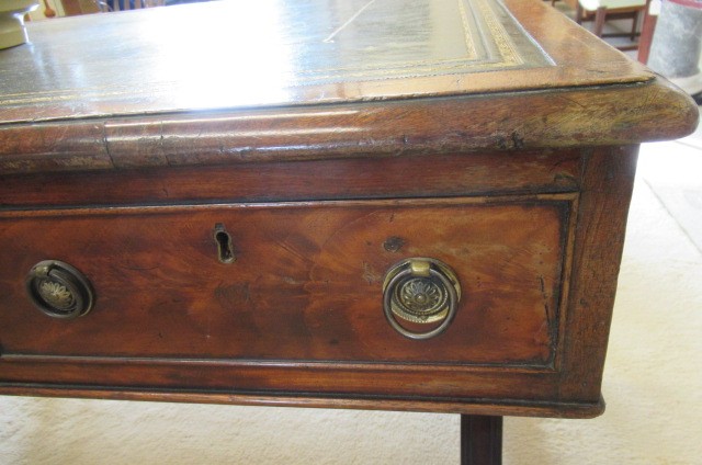 A REGENCY MAHOGANY LIBRARY TABLE Image