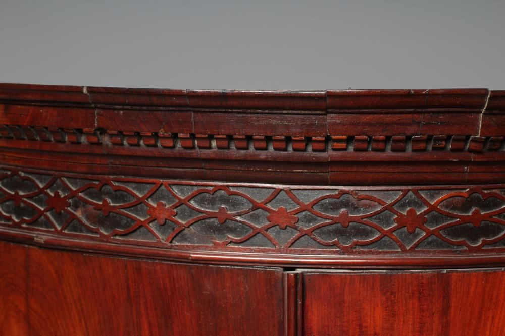 A GEORGIAN MAHOGANY BOWED CORNER CUPBOARD Image